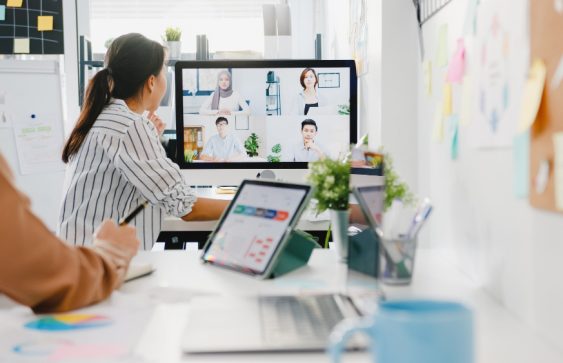 asia-businesspeople-using-desktop-talk-colleagues-discussing-business-brainstorm-about-plan-video-call-meeting-new-normal-office